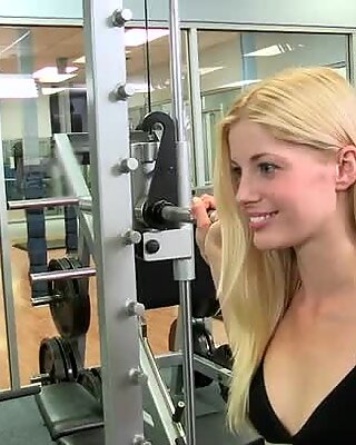 Charlotte Stokely is working out in a gym